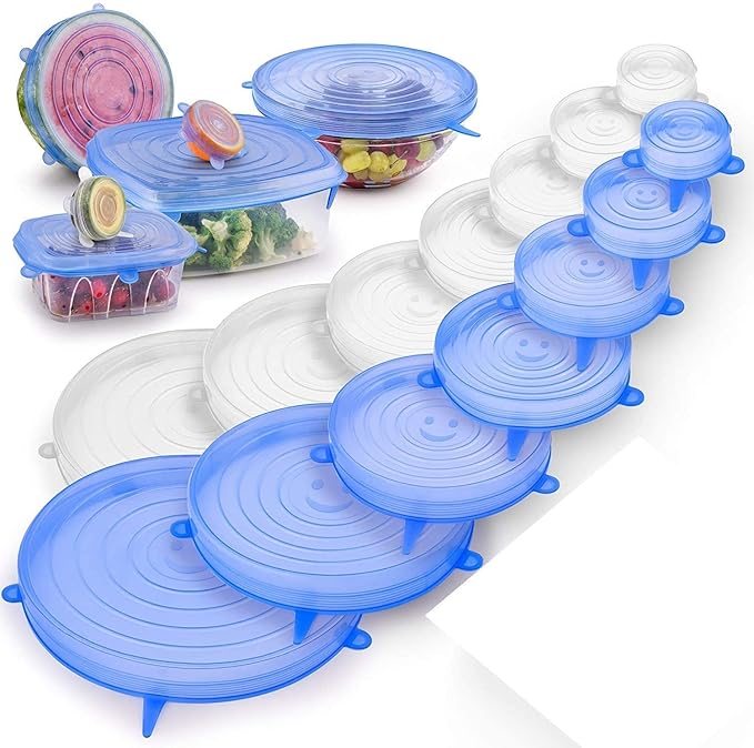 Assorted reusable blue stretch covers displayed over kitchen bowls and containers